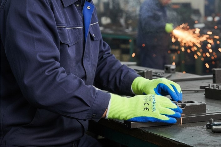 worker wearing thermal latex gloves worker wearing thermal latex gloves